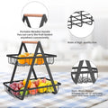 GoHooked black 2-tier metal fruit basket with wooden handle, open mesh design for air circulation.