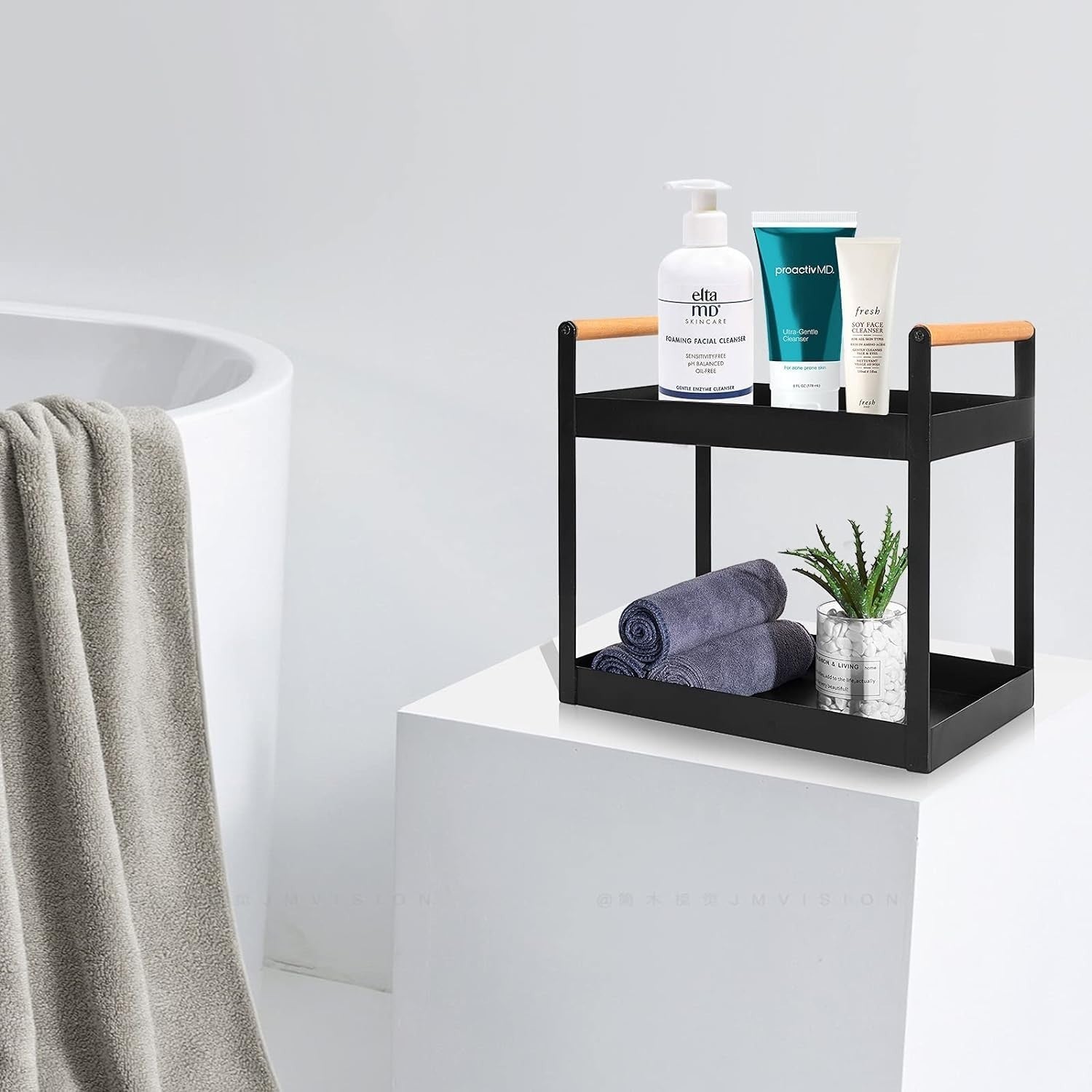 GoHooked black metal 2-tier standing rack with wood handles, holding toiletries and towels.