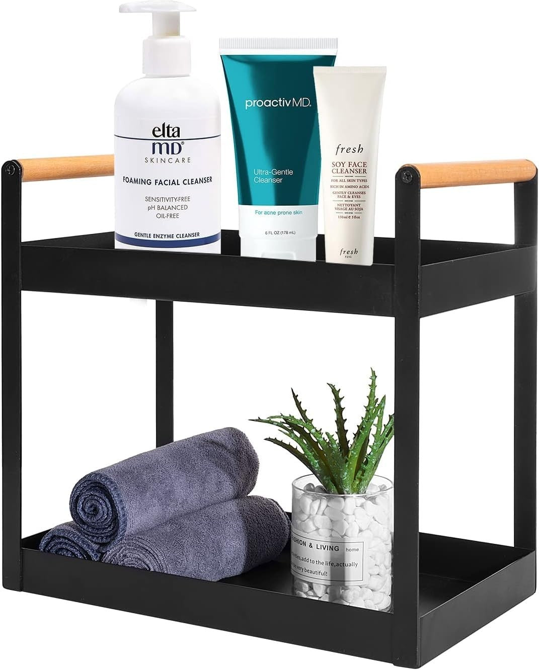 GoHooked black metal 2-tier standing rack with wood handles, holding skincare products and towels.