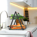 GoHooked black metal 2-tier storage basket with bamboo handle, holding broccoli, tomatoes, and carrots on a kitchen counter.