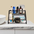 GoHooked black 2-tier metal vanity rack organizer with various bathroom and skincare products displayed.