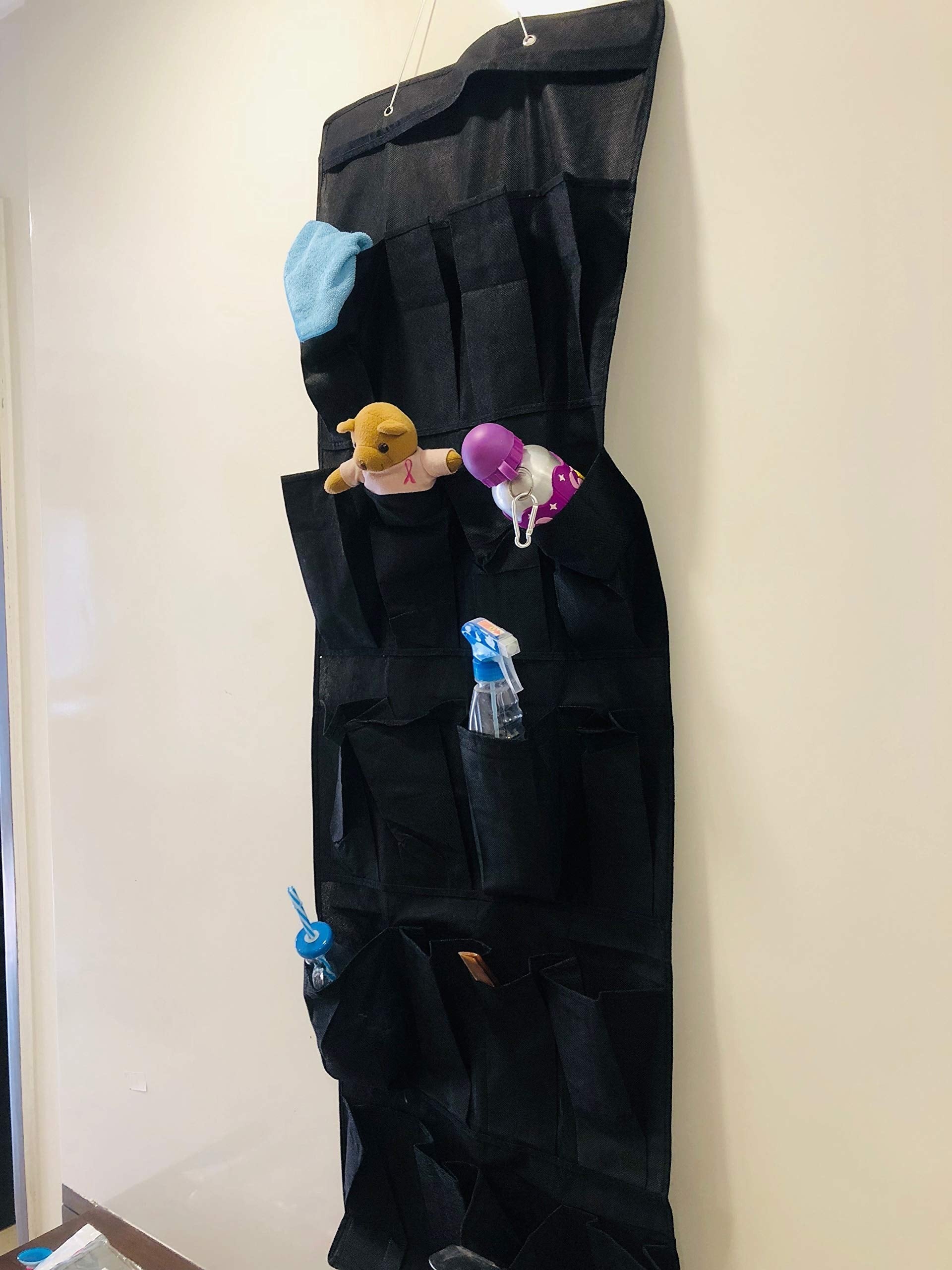 GoHooked black 20-pocket non-woven fabric over-the-door organizer with clear pockets for shoes, accessories, and household items.