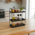 GoHooked 3 tier black metal curved countertop organizer rack with spice jars, oil bottle, and plant.
