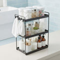 GoHooked black 3-tier standing rack organizer with hooks, holding bathroom essentials like soap, towels, and jars.
