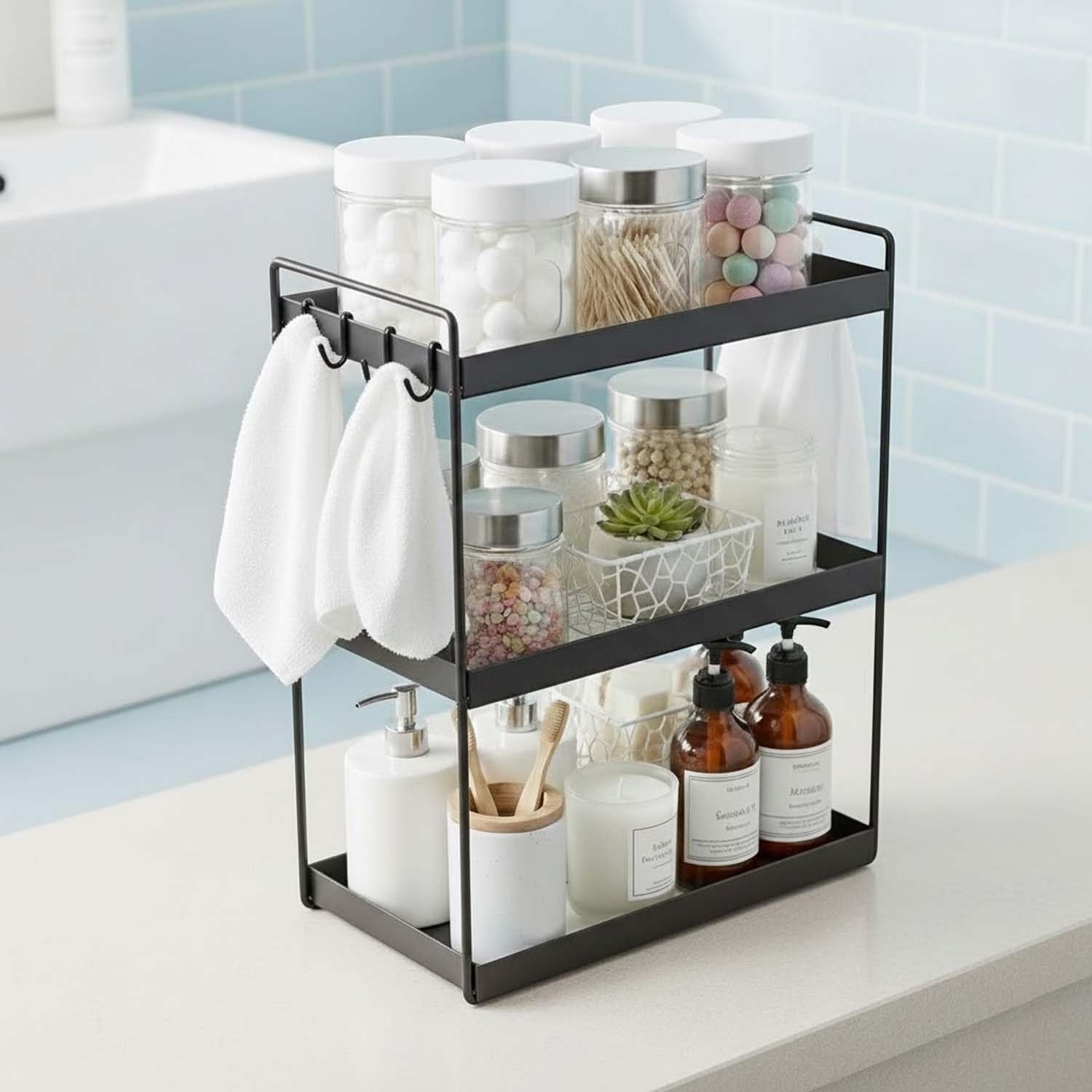 GoHooked black 3-tier standing rack organizer with hooks, holding bathroom essentials like soap, towels, and jars.
