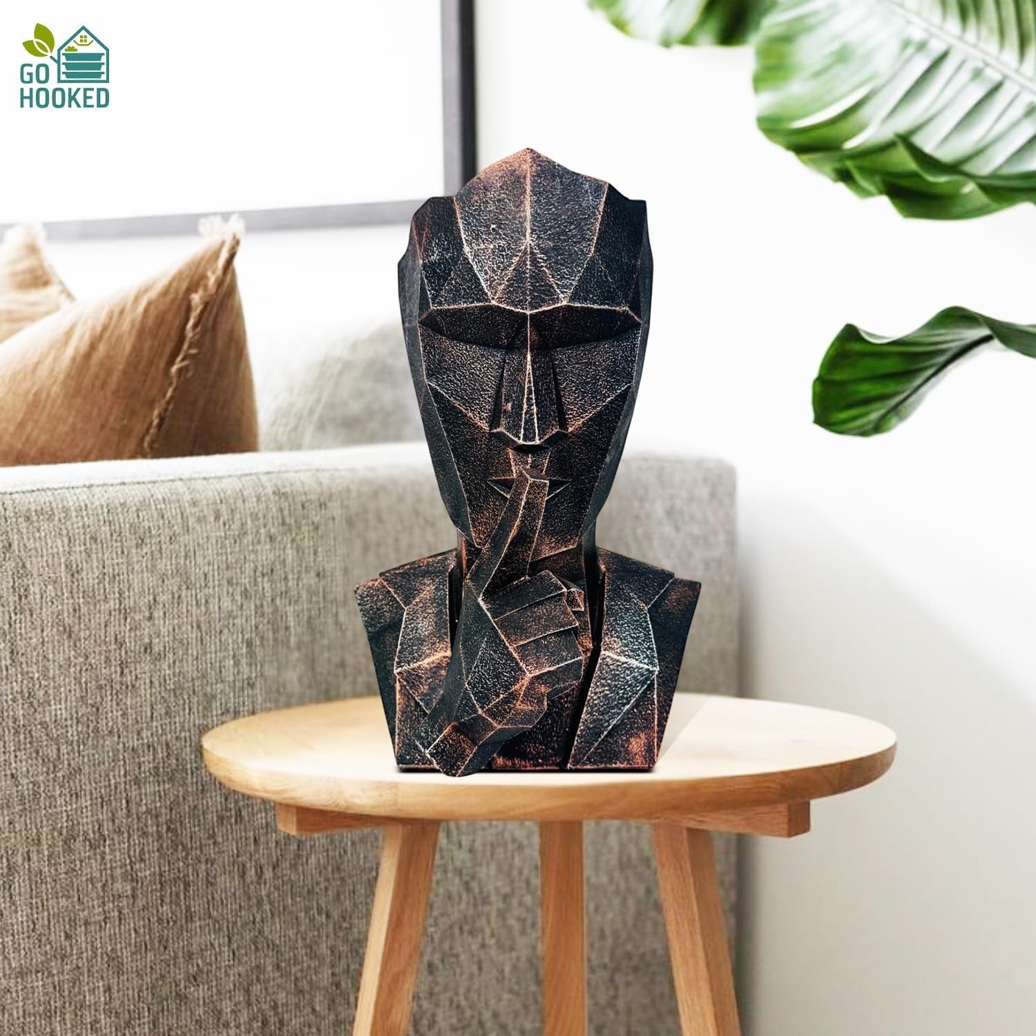 Go Hooked abstract geometric bust statue in black copper finish, representing 'Speak No Evil'.