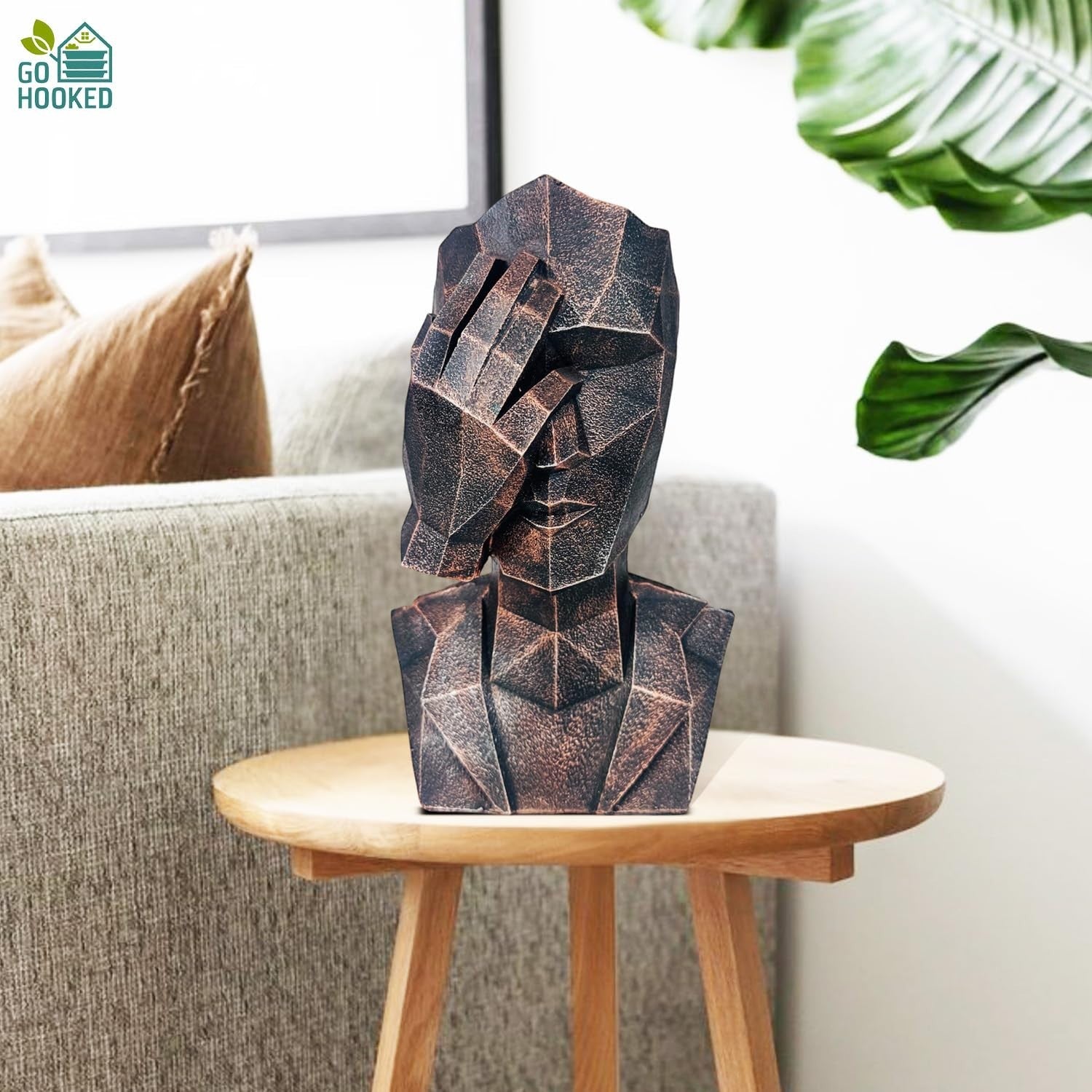 Go Hooked abstract geometric face bust statue in black copper finish, representing 'See No Evil'.