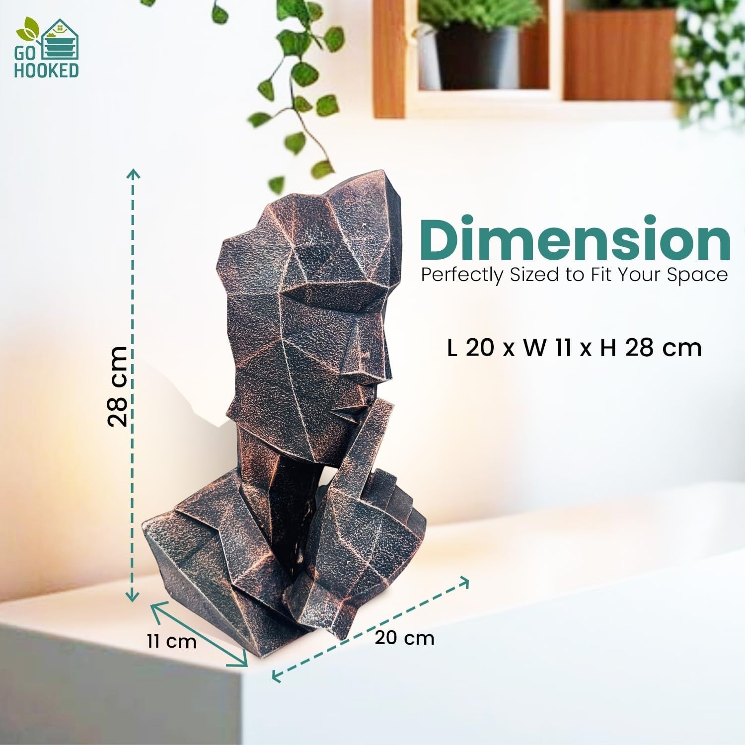 Go Hooked abstract geometric polyresin showpiece in black copper finish, depicting a face with finger to lips. Modern decor.