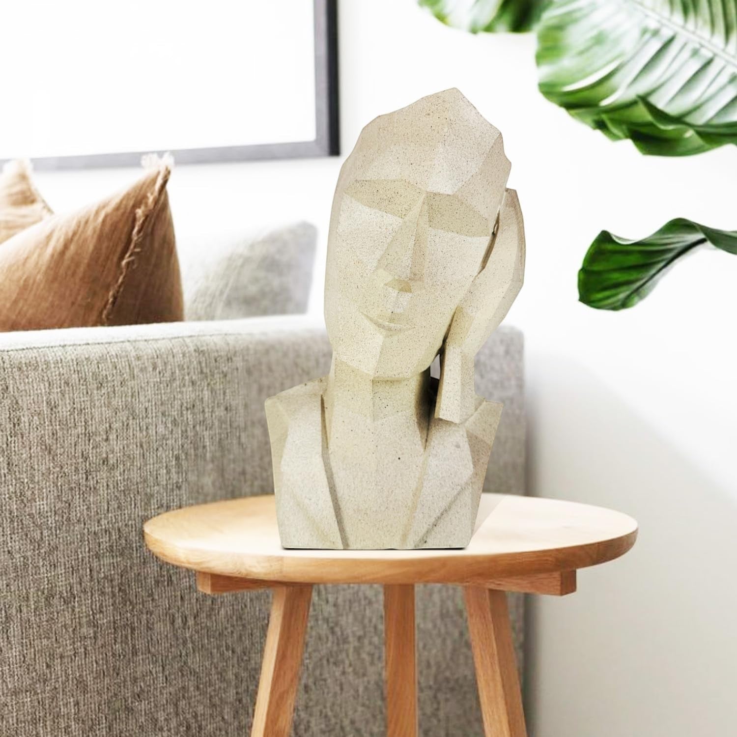 GoHooked abstract geometric polyresin showpiece in marble finish, depicting a face with hand to cheek.