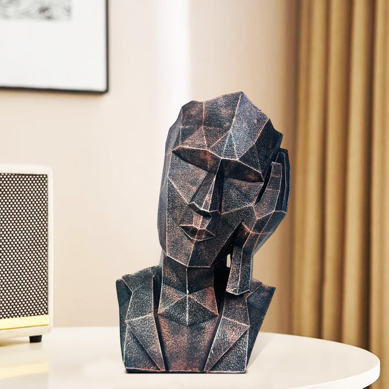 Go Hooked abstract geometric face statue in black copper finish, representing 'Hear No Evil'. Modern polyresin decor.