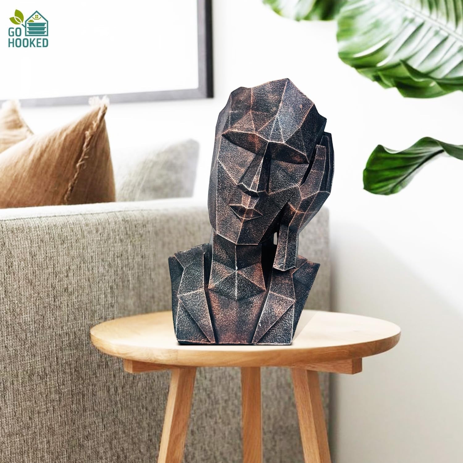 Go Hooked abstract geometric human face statue, black copper finish, representing 'Hear No Evil'. Polyresin, modern decor.