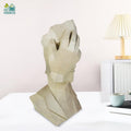 Go Hooked abstract geometric face statue in marble finish, made of polyresin. Modern decor for living rooms.