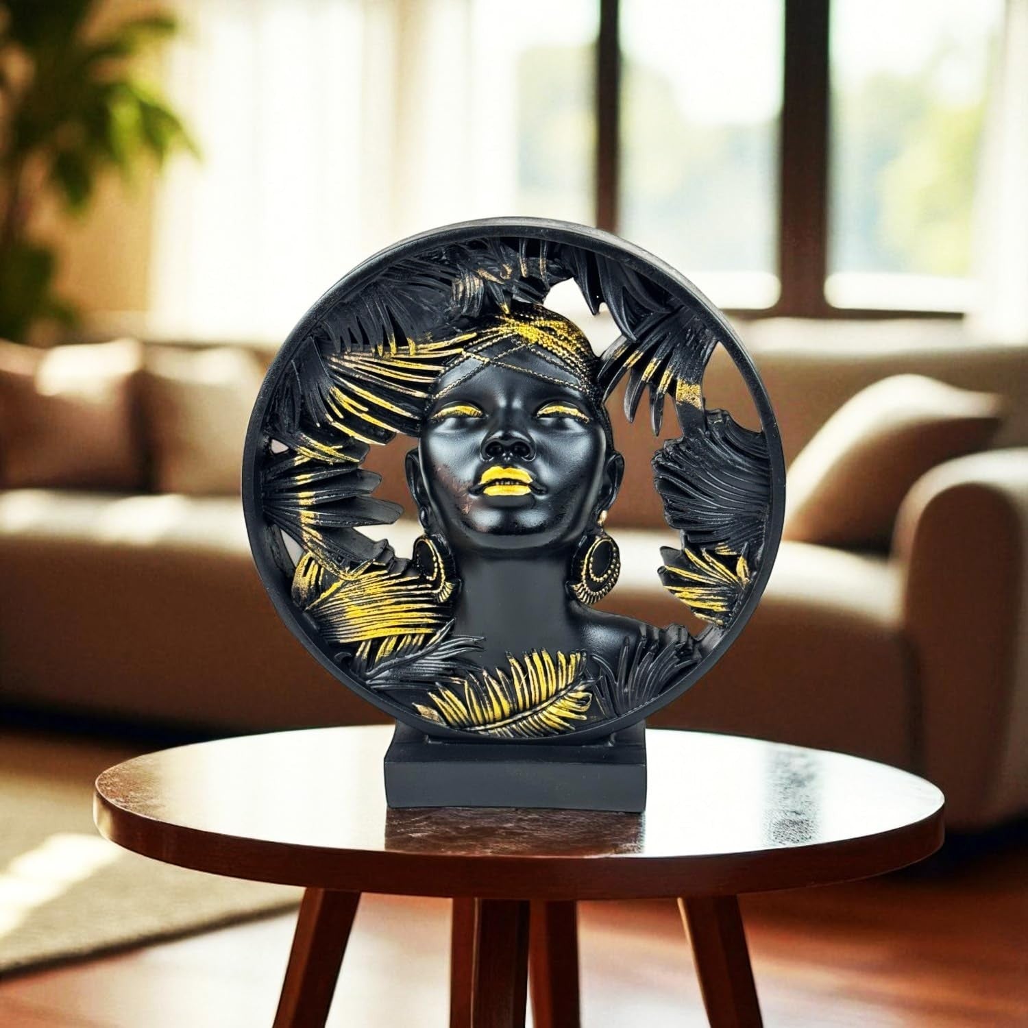 GoHooked black and gold polyresin African lady bust statue with palm leaf circular frame, 22 cm tall.