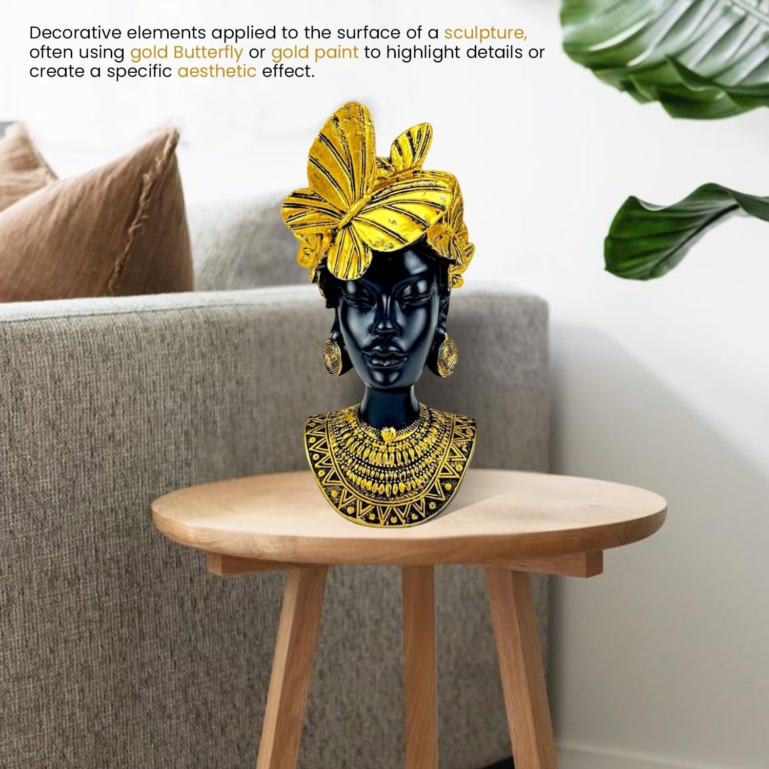 Go Hooked black polyresin bust of an African queen with gold butterflies and tribal jewelry, 26 cm tall.