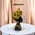 Go Hooked black polyresin bust of an African queen with gold butterflies and roses on her head, 26cm tall.