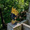 GoHooked black polyresin bust of an African queen with gold butterfly and rose headdress, earrings, and necklace.