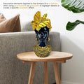 GoHooked black polyresin bust of an African queen with gold butterflies, tribal jewelry, and earrings. 26cm tall.