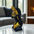 GoHooked black and gold polyresin bust of an African tribal lady wearing a mask and crown, with intricate gold detailing.