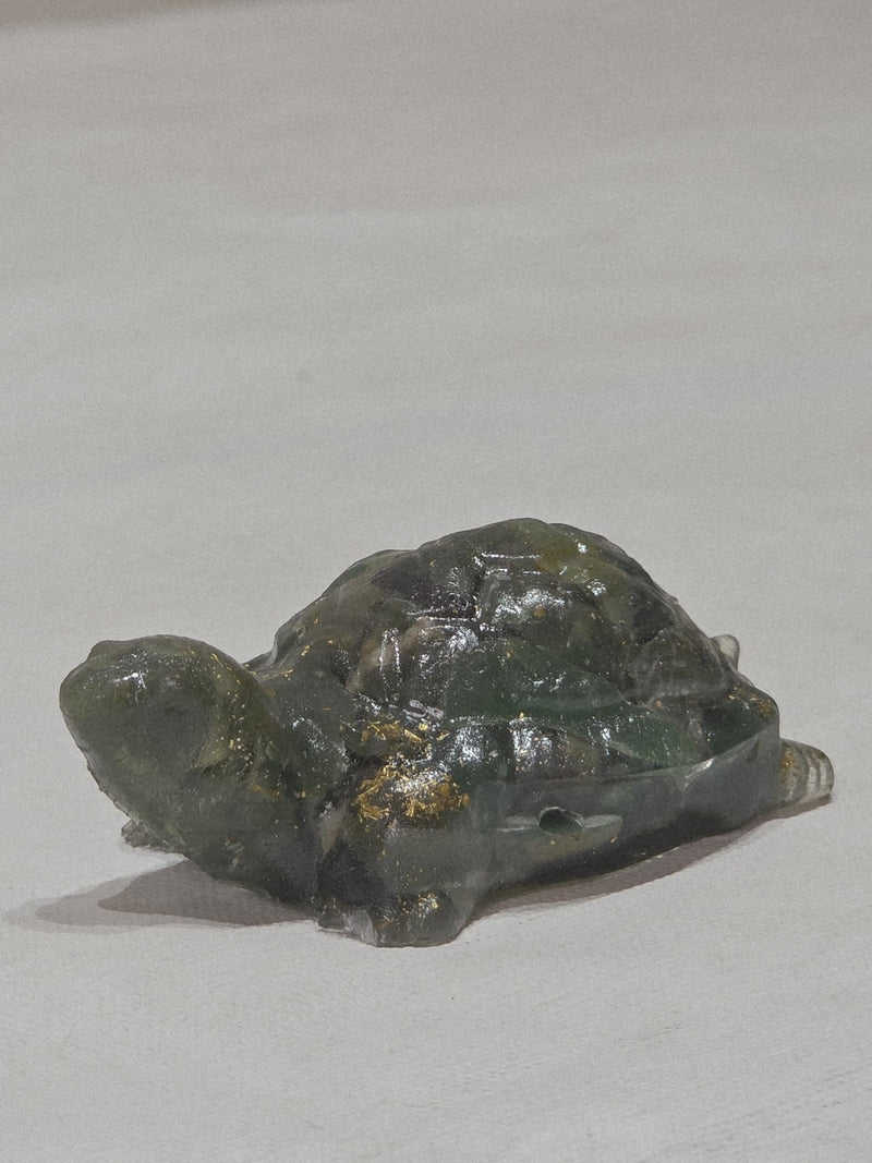 GoHooked natural amethyst crystal tortoise figurine for peace and healing. Purple stone with gold flecks, ideal for Feng Shui decor.