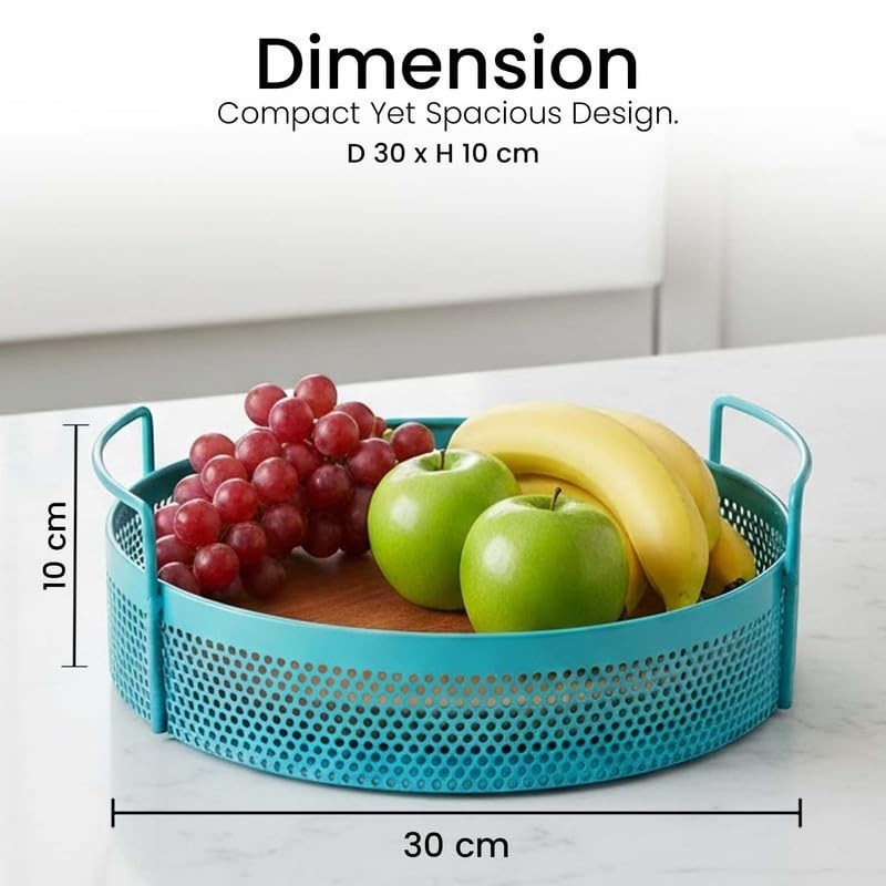 GoHooked aqua blue round metal storage tray with handles, perforated design, holding fruit. Ideal for home decor.