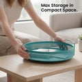 GoHooked aqua blue round metal storage tray with perforated sides and side handles, perfect for home decor.