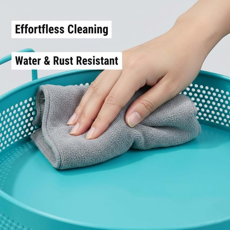 GoHooked aqua blue round metal storage tray with perforated sides and handles, being wiped clean.