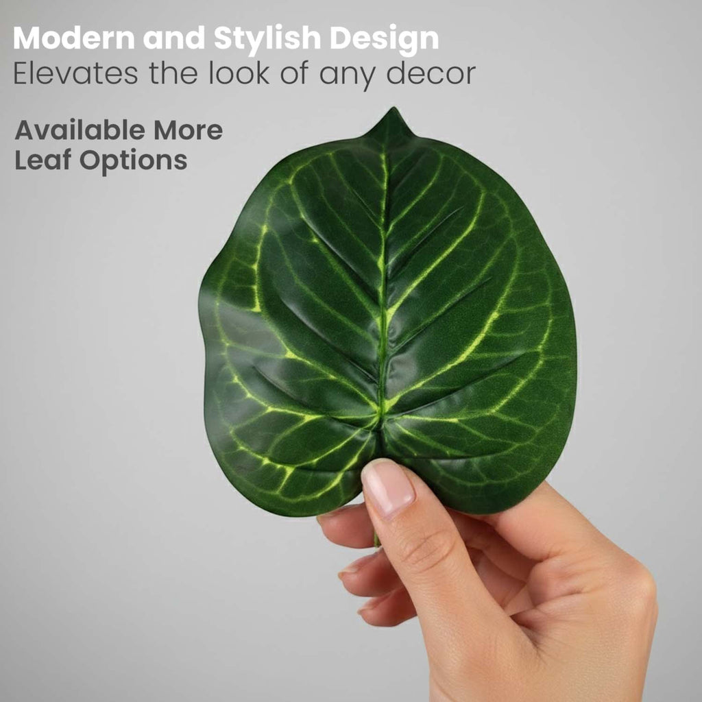 GoHooked artificial green Alocasia leaf with realistic veins held by a hand against a neutral background