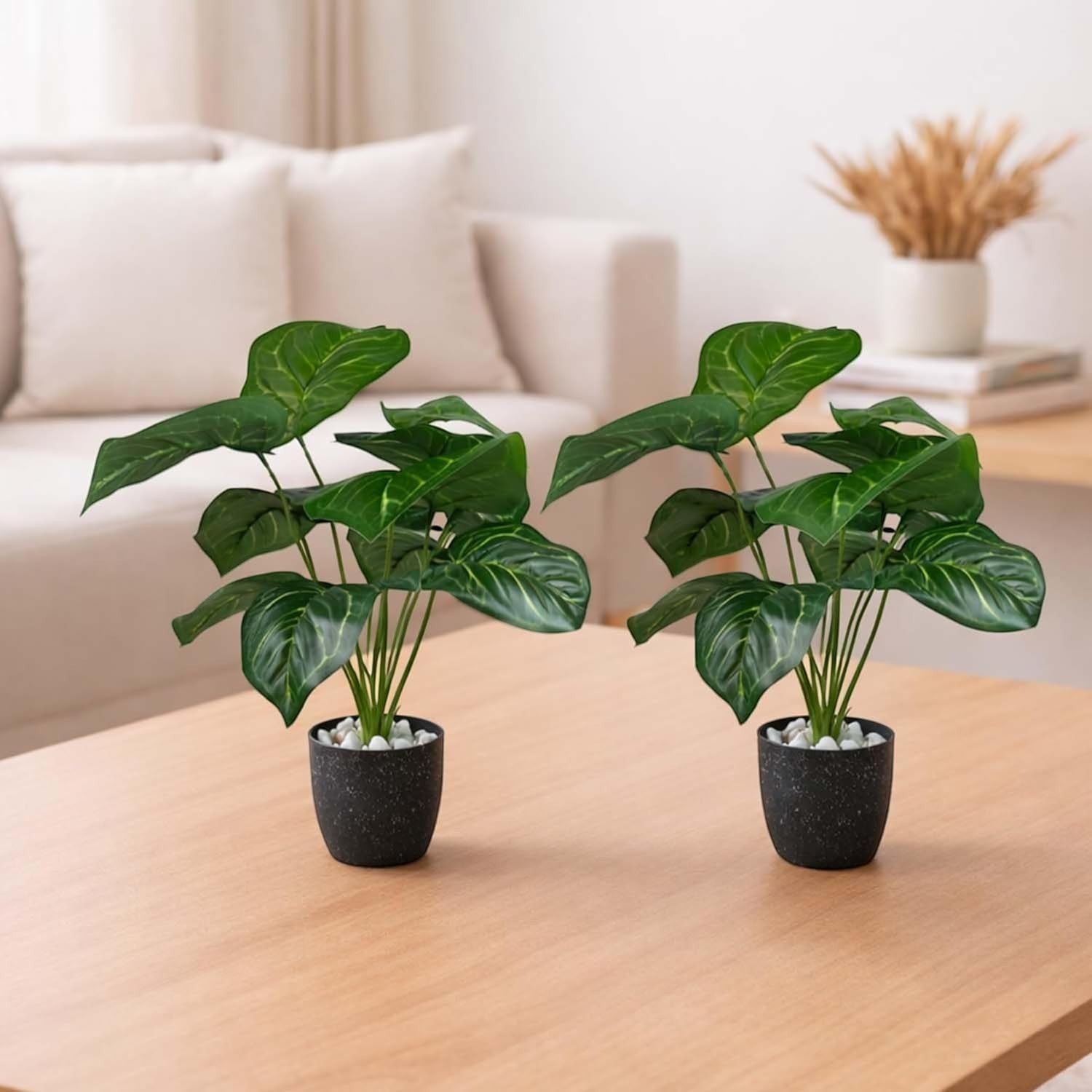 Go Hooked set of 2 artificial green anthurium plants with patterned leaves in black speckled pots with white pebbles.