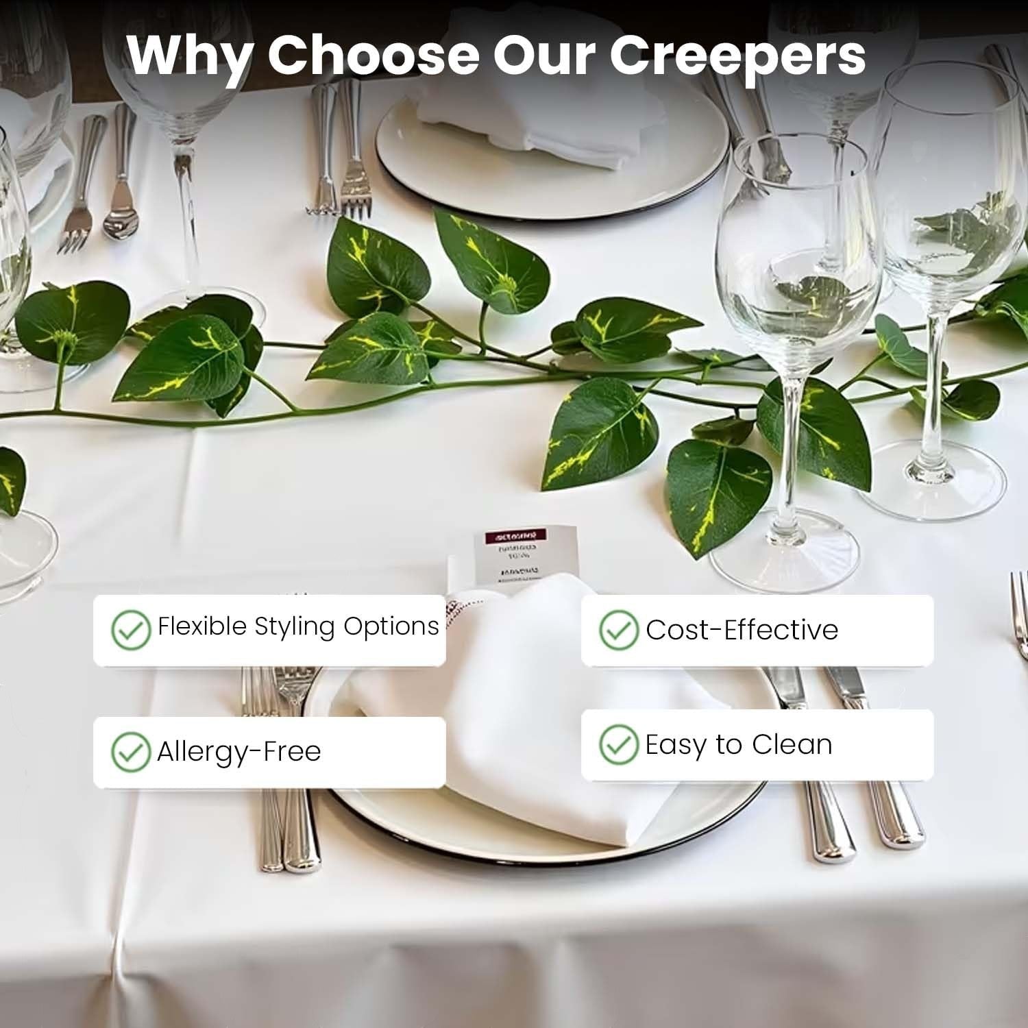 GoHooked green arrowhead leaf artificial creeper garland draped over a white tablecloth with place settings.