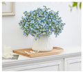 GoHooked 5pcs light blue artificial baby's breath flowers with realistic rubber heads and plastic stems.