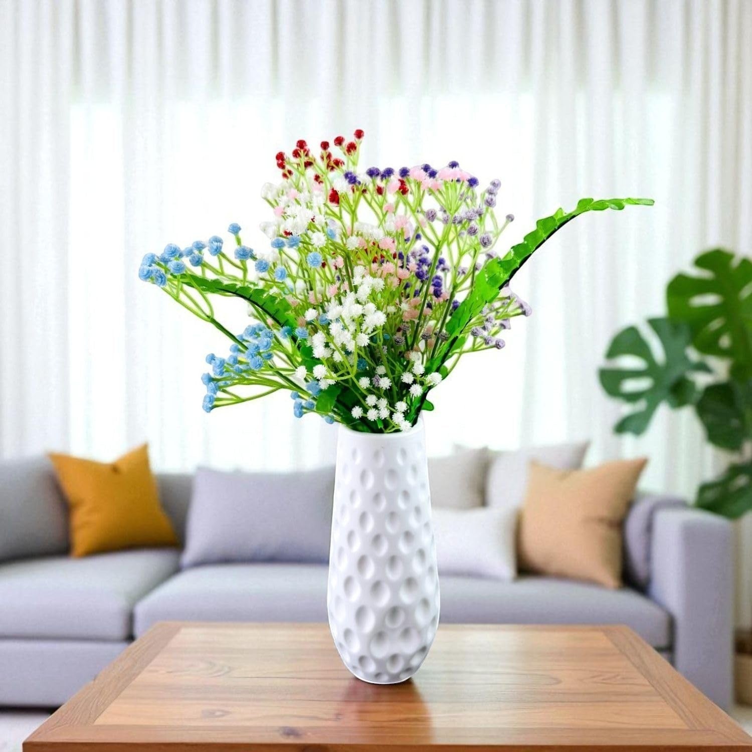 GoHooked multicolor artificial baby's breath flowers in a white textured vase, perfect for home decor and floral arrangements.