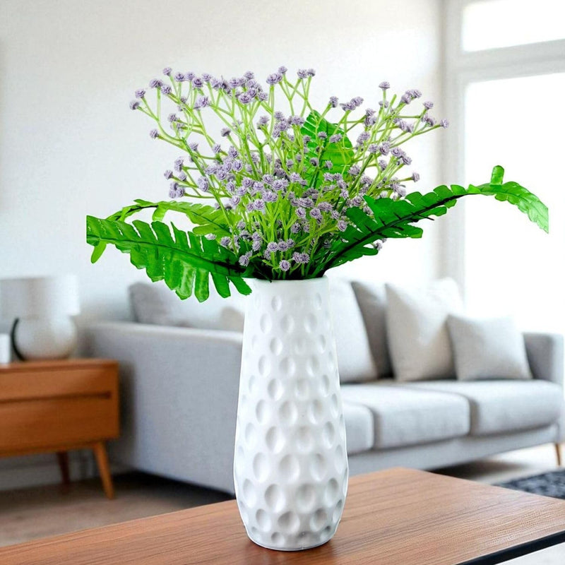 Go Hooked artificial purple baby's breath flowers with green leaves in a white textured vase, realistic rubber and plastic construction.