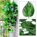 Go Hooked pack of 5 green artificial arrowhead leaf creepers, 7 ft each, realistic plastic vines for home decor.