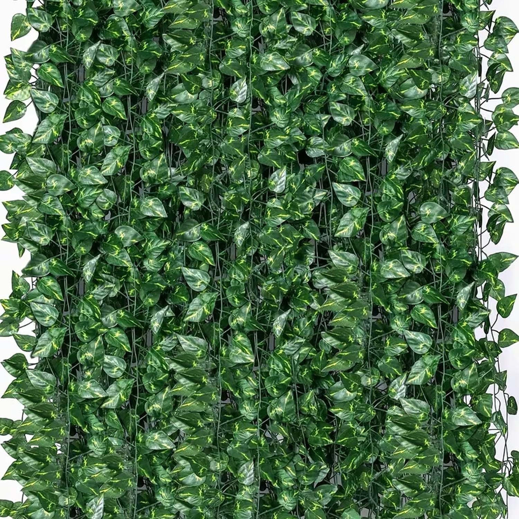 GoHooked pack of 12 green plastic artificial Pilea coin leaf creepers, 7 ft each, for home decor.