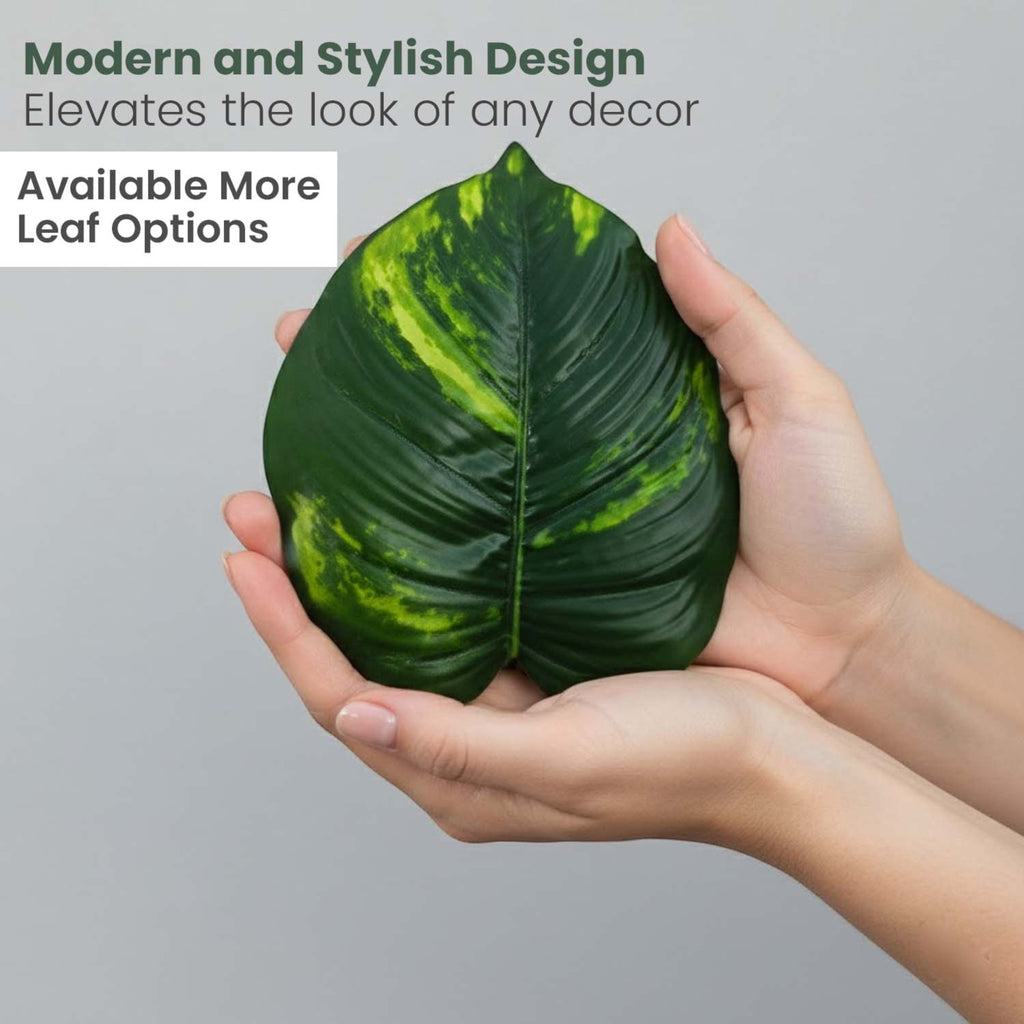 GoHooked artificial Dieffenbachia leaf with realistic green and yellow variegation held in hands