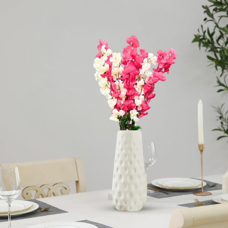 Go Hooked artificial pink and white flowers in a textured white ceramic vase, perfect for home or office decor.