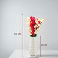 GoHooked yellow and red artificial flowers in a white textured vase. Realistic faux blossoms for home and office decor.