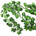 GoHooked artificial maple leaf garland, 6ft, green polyester fabric, realistic vine for home and party decor.