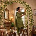 Go Hooked artificial maple leaf creeper garland with fairy lights, 6 ft, green plastic leaves, for home decor.