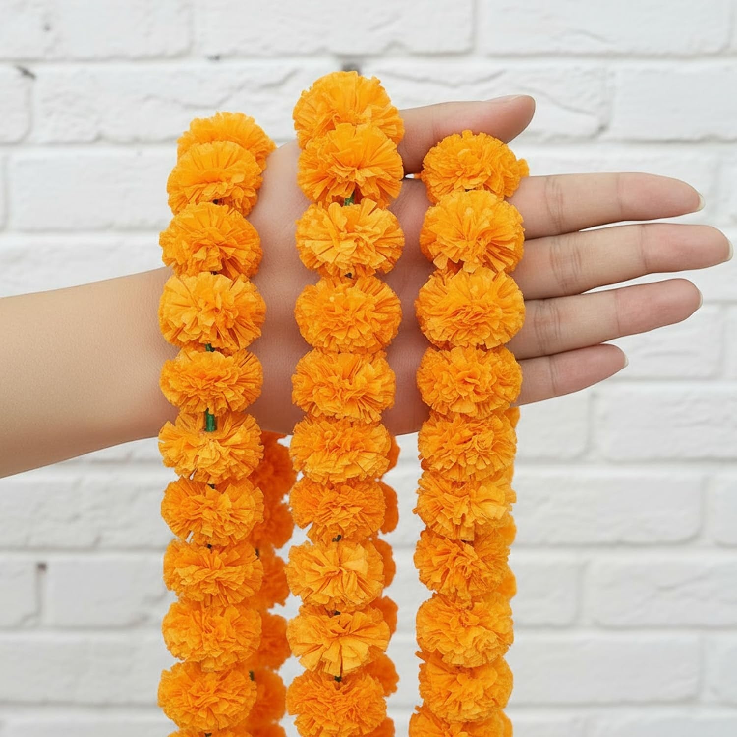 GoHooked Set of 10 orange artificial marigold flower garlands, 4.5 ft each, made of fibre for festive decor.