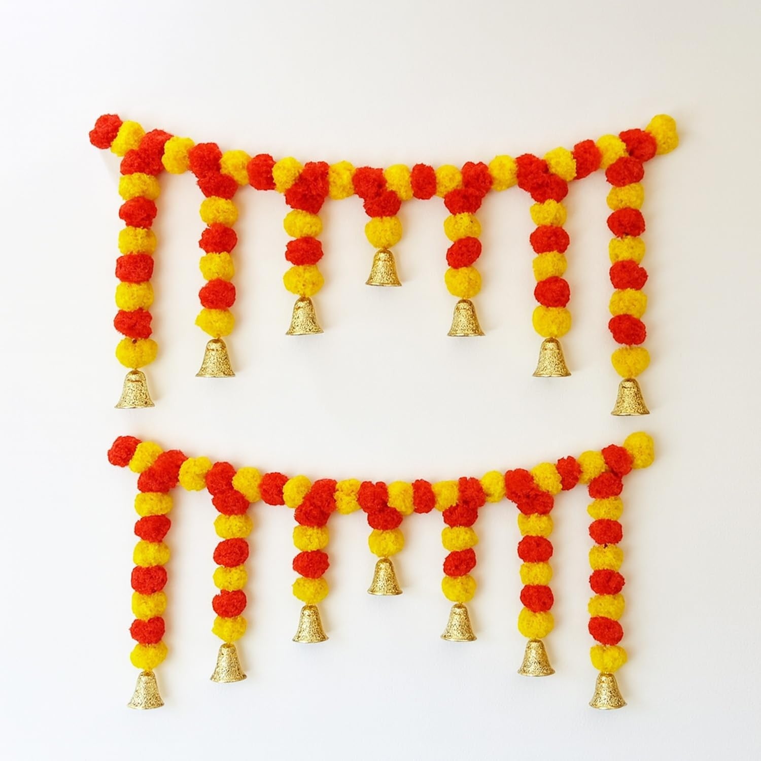GoHooked set of 2 artificial marigold flower torans in orange and yellow with golden bells, 43 inches long, for door hanging decoration.