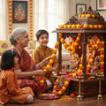 GoHooked yellow and orange artificial marigold toran garland decorating a home altar with a grandmother and children.
