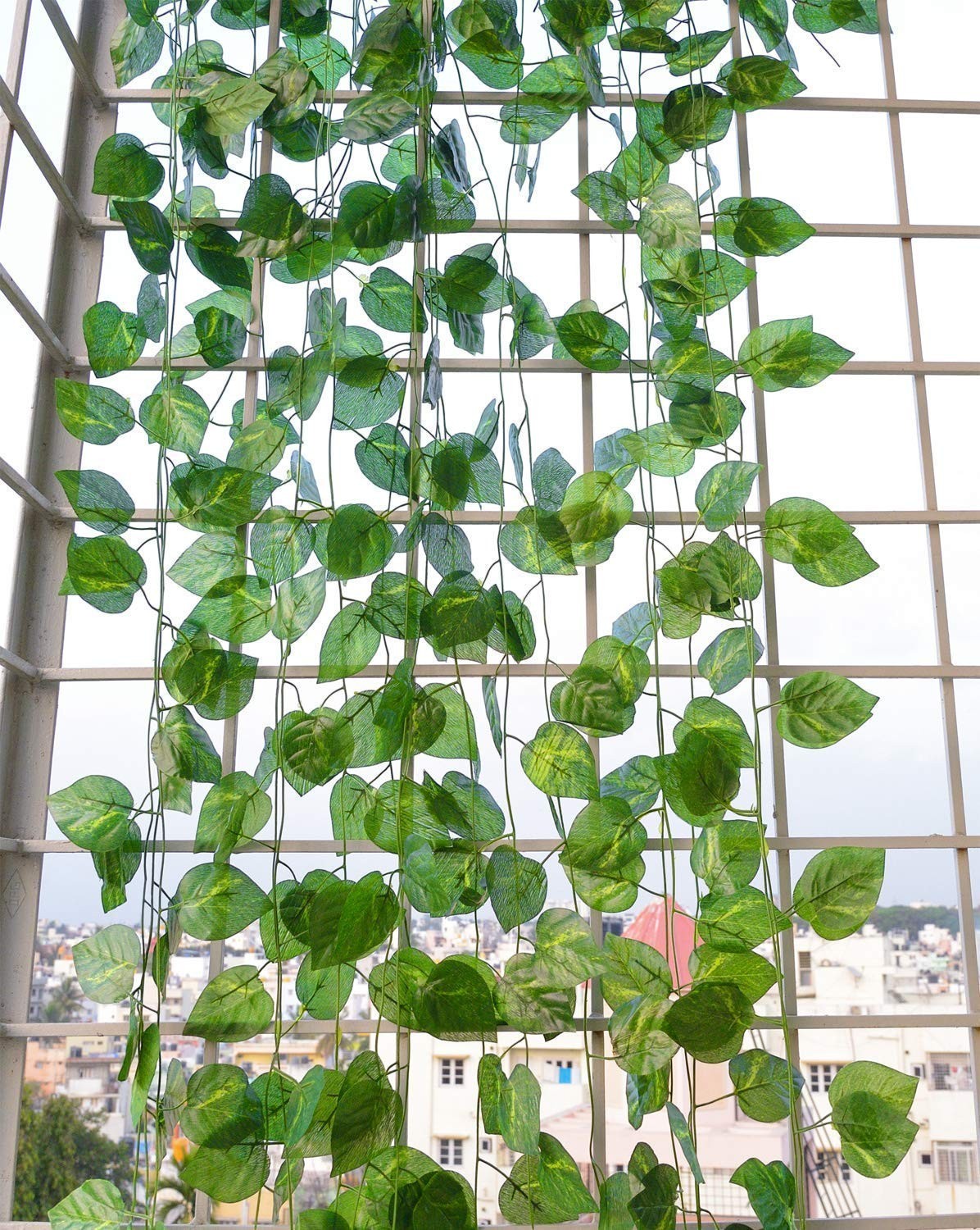 GoHooked artificial money plant garland, 5 strings of green polyester leaves, 6 feet each, for home and party decor.