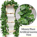 GoHooked pack of 24 green artificial money plant leaf vines, 6ft each, polyester fabric for home and party decor.