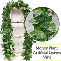 GoHooked pack of 8 green artificial money plant leaf vines, 6ft each, for home and party decor.