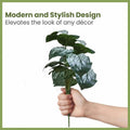 GoHooked artificial Monstera Dubia plant with 18 green patterned polyester leaves, held in a hand.