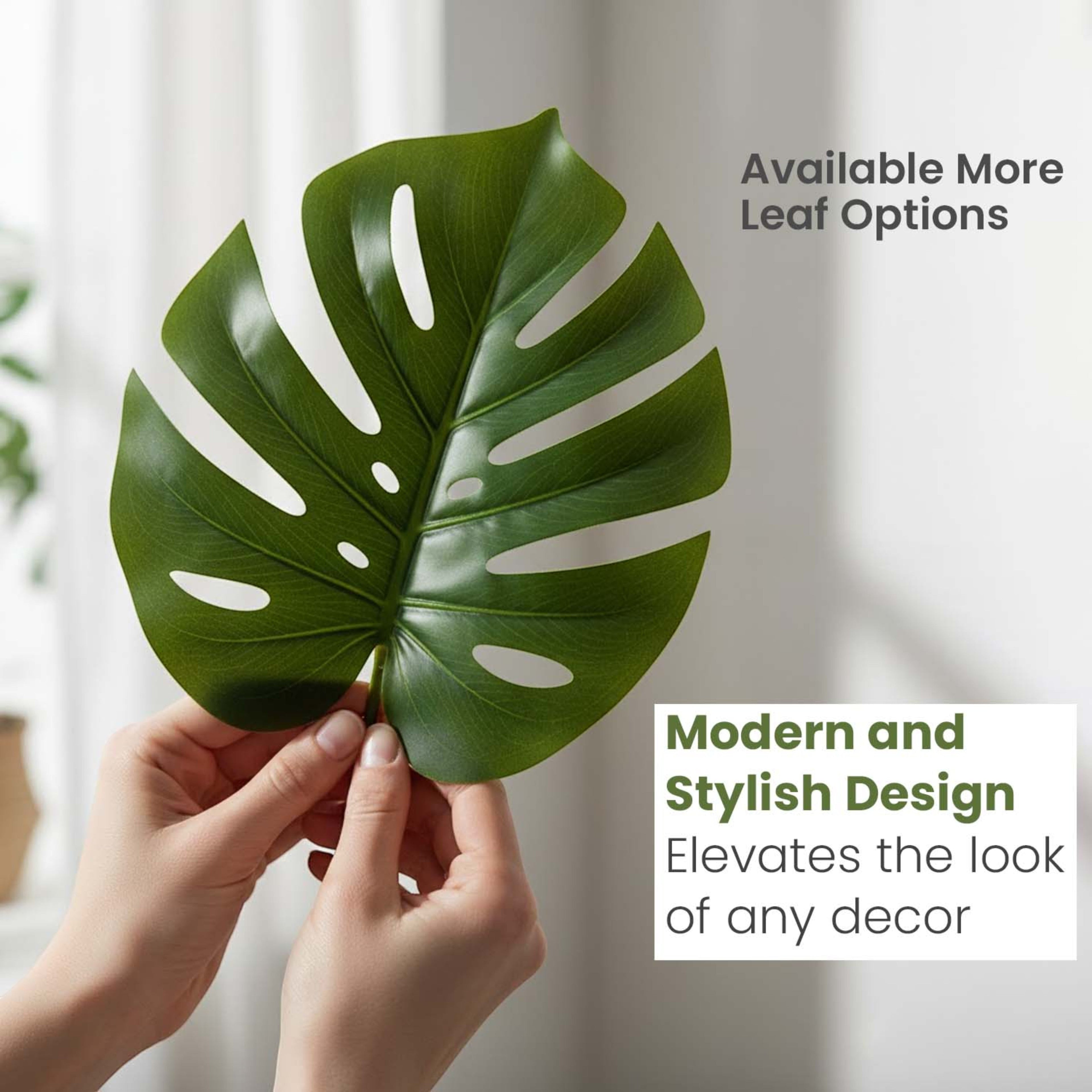 GoHooked artificial monstera leaf with realistic green texture held by hands for modern home decor styling