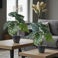 GoHooked artificial monstera plant with 12 green leaves in a dark grey pot, realistic polyester indoor decor.
