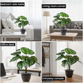 GoHooked artificial Monstera plant with 12 green patterned leaves in a black nursery pot. Realistic polyester decorative indoor plant.