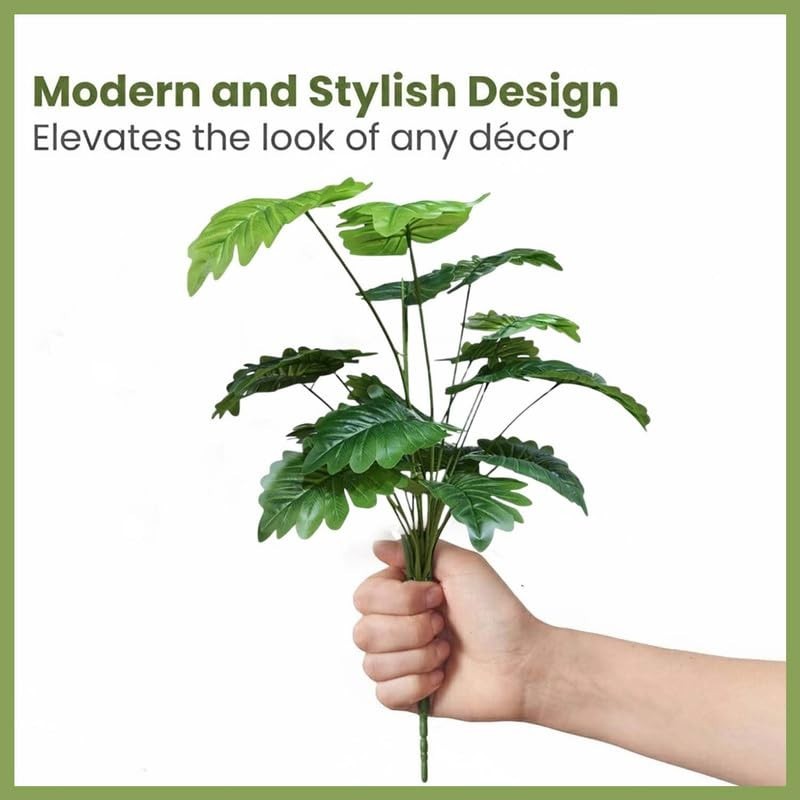 GoHooked artificial Monstera Deliciosa plant with 18 green patterned polyester leaves, held in a hand.